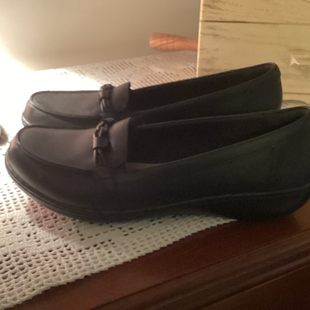Clarks Women's Black Slip-On Loafers with Subtle Knot Detail
